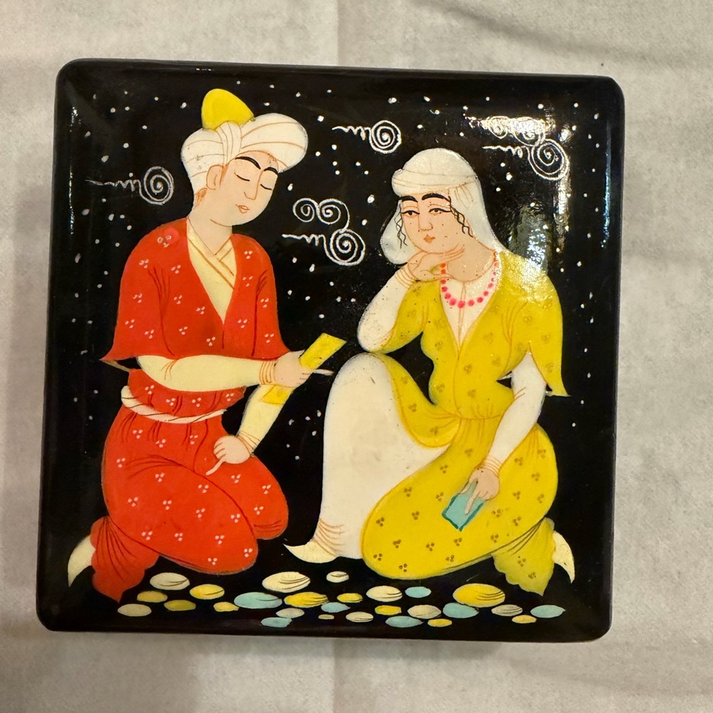 Decorative Black Box with Red and Yellow Figures